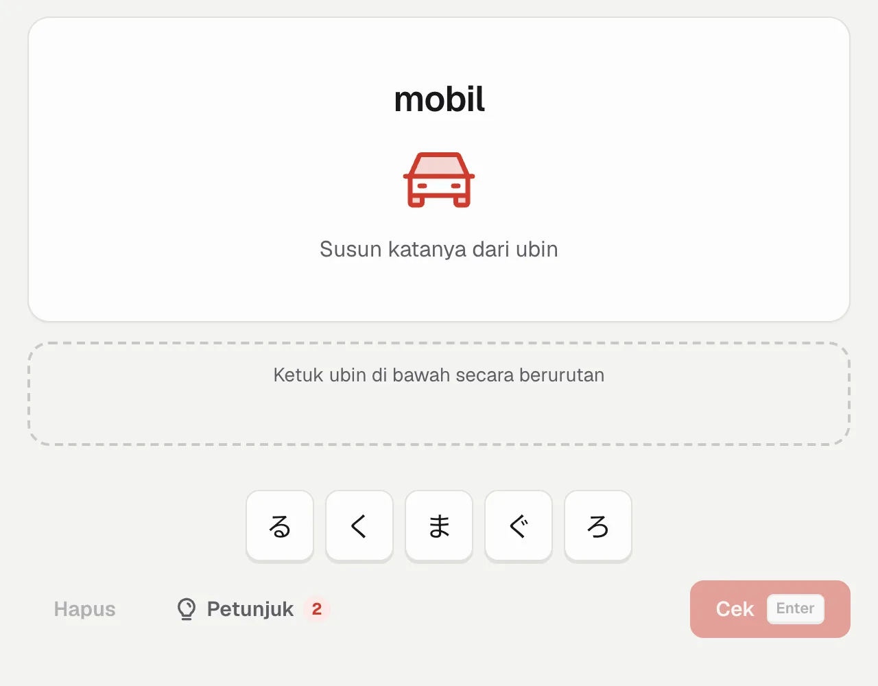 Mengeja: kata mobil dengan ikon, dan ubin く, る, ま di samping ぐ dan ろ yang mirip